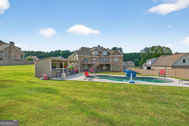 2112 Meadowood Cv, Monroe, GA 30655 - rear view of house featuring a patio area, stone siding, and stairway