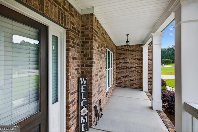 2112 Meadowood Cv, Monroe, GA 30655 - view of covered porch
