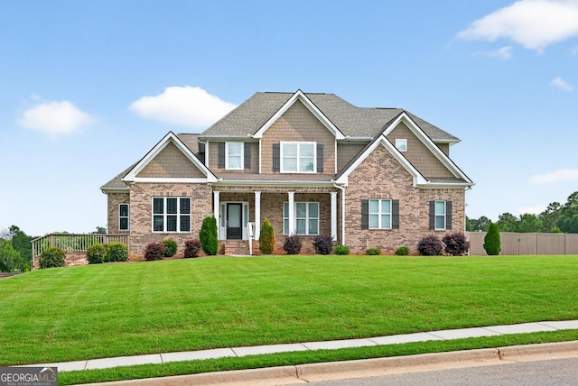 2112 Meadowood Cv, Monroe, GA 30655 - craftsman house with covered porch and brick siding