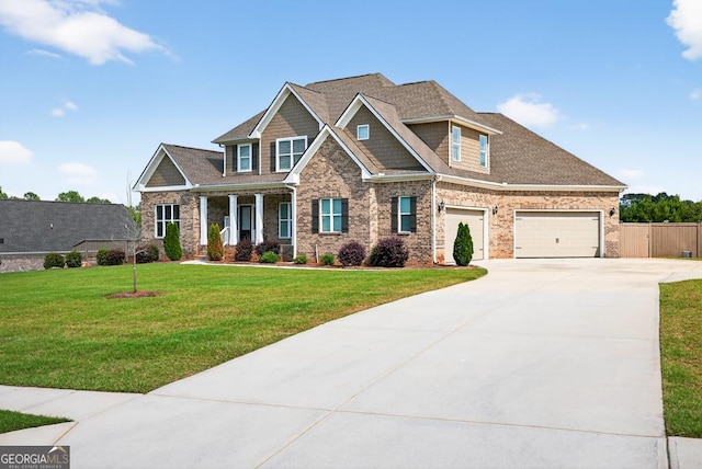 2112 Meadowood Cv, Monroe, GA 30655 - craftsman inspired home featuring driveway, a porch, and brick siding