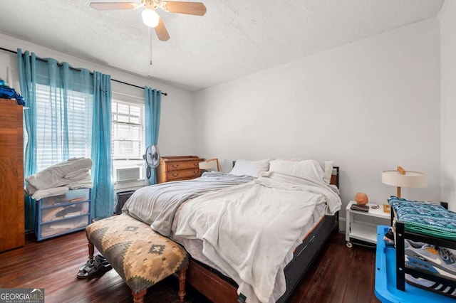 1639 Rogers Ave SW, Atlanta, GA 30310 - bedroom featuring wood finished floors, a textured ceiling, cooling unit, and a ceiling fan