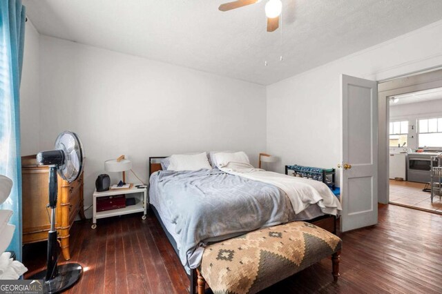 1639 Rogers Ave SW, Atlanta, GA 30310 - bedroom with hardwood / wood-style floors, washer / dryer, and ceiling fan