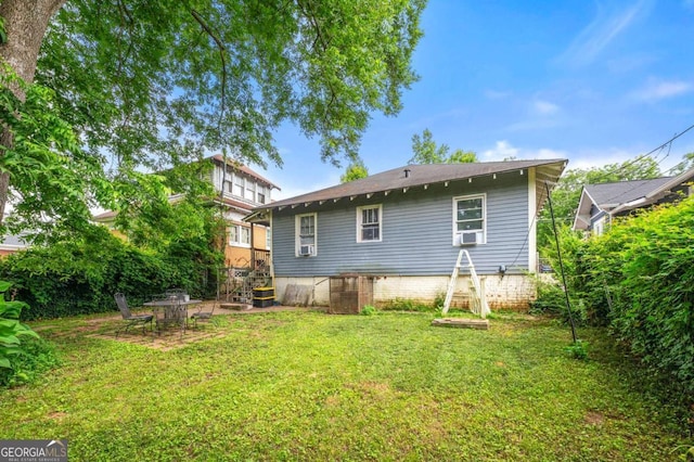 1639 Rogers Ave SW, Atlanta, GA 30310 - rear view of property featuring a lawn and cooling unit