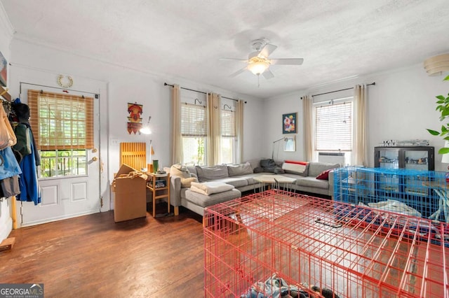 1639 Rogers Ave SW, Atlanta, GA 30310 - living area featuring wood finished floors, crown molding, a ceiling fan, and a textured ceiling