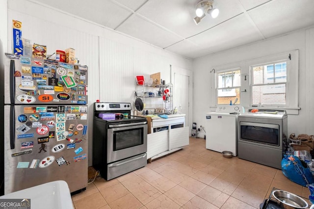 1639 Rogers Ave SW, Atlanta, GA 30310 - kitchen featuring stainless steel appliances, light countertops, and light tile patterned floors