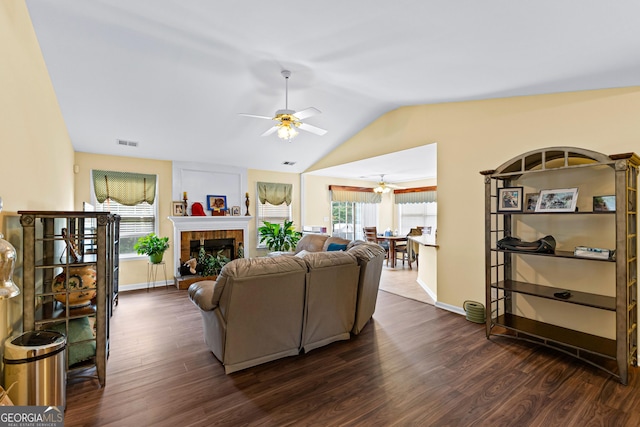 10 Links Ct, Newnan, GA 30265 - living room with ceiling fan, dark wood-type flooring, vaulted ceiling, and plenty of natural light