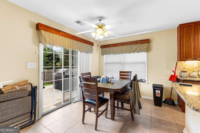 10 Links Ct, Newnan, GA 30265 - dining area with ceiling fan and light tile patterned floors