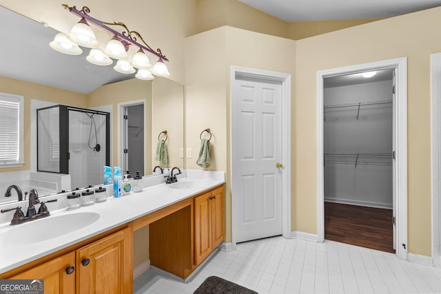 10 Links Ct, Newnan, GA 30265 - full bathroom with a stall shower, a spacious closet, double vanity, tile patterned flooring, and a bath