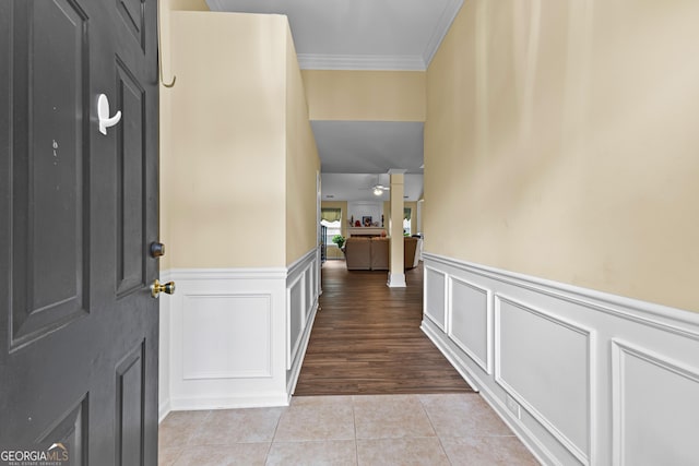 10 Links Ct, Newnan, GA 30265 - foyer featuring tile patterned floors, ornamental molding, a decorative wall, and a wainscoted wall