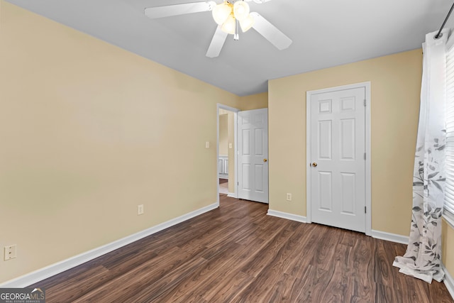 10 Links Ct, Newnan, GA 30265 - unfurnished bedroom featuring dark wood-type flooring and a ceiling fan