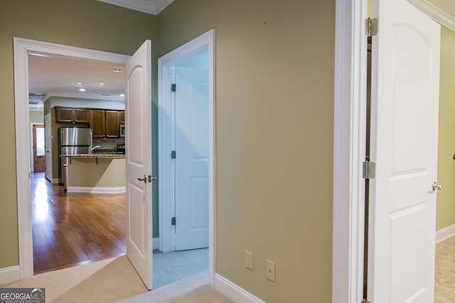 105 Maplecrest Ln SE, Rome, GA 30161 - hallway with ornamental molding, recessed lighting, and light wood finished floors