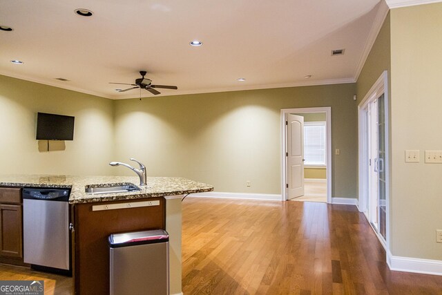 105 Maplecrest Ln SE, Rome, GA 30161 - kitchen featuring dishwasher, ornamental molding, ceiling fan, light wood finished floors, and light stone counters