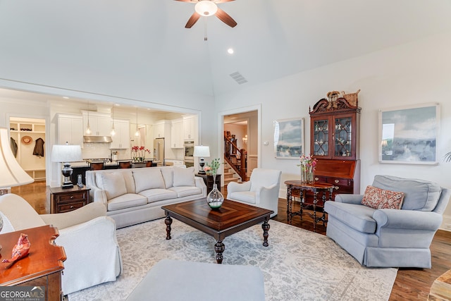 1911 Bent Pine Park, Statham, GA 30666 - living room featuring a ceiling fan, light wood-style floors, stairs, high vaulted ceiling, and recessed lighting