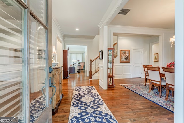 1911 Bent Pine Park, Statham, GA 30666 - foyer featuring stairs, ornamental molding, dark wood finished floors, a wainscoted wall, and recessed lighting