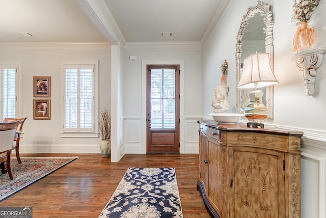 1911 Bent Pine Park, Statham, GA 30666 - foyer featuring ornamental molding, a wainscoted wall, and dark wood-type flooring