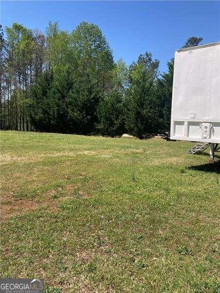 1565 Dr Bramblett Rd, Cumming, GA 30028 - view of green lawn