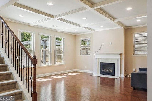 2638 Lake Manor Cir, Duluth, GA 30096 - unfurnished living room with wood finished floors, coffered ceiling, stairs, a fireplace with flush hearth, and beamed ceiling