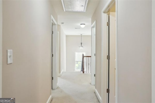 2638 Lake Manor Cir, Duluth, GA 30096 - hall with an upstairs landing and light carpet