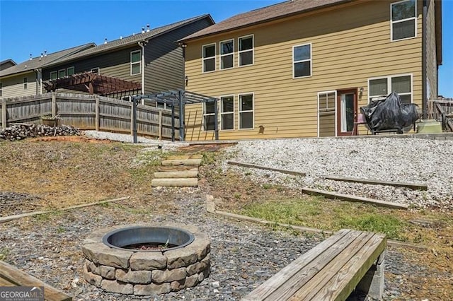 2638 Lake Manor Cir, Duluth, GA 30096 - back of property with a fire pit and a pergola