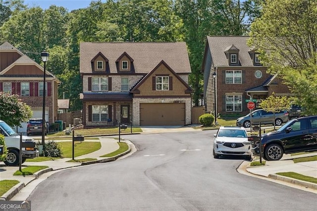2638 Lake Manor Cir, Duluth, GA 30096 - view of front of property with brick siding, driveway, and an attached garage