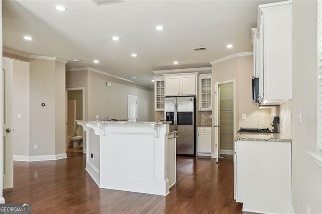 2638 Lake Manor Cir, Duluth, GA 30096 - kitchen featuring stainless steel fridge with ice dispenser, crown molding, white cabinetry, dark wood-style flooring, and recessed lighting