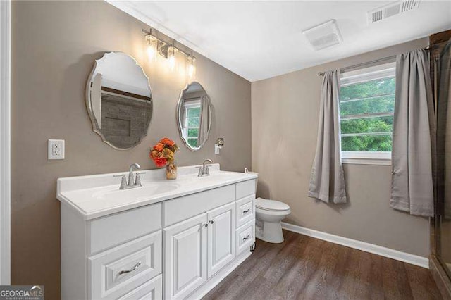 154 Fairview Rd, Ball Ground, GA 30107 - bathroom featuring double vanity and wood finished floors