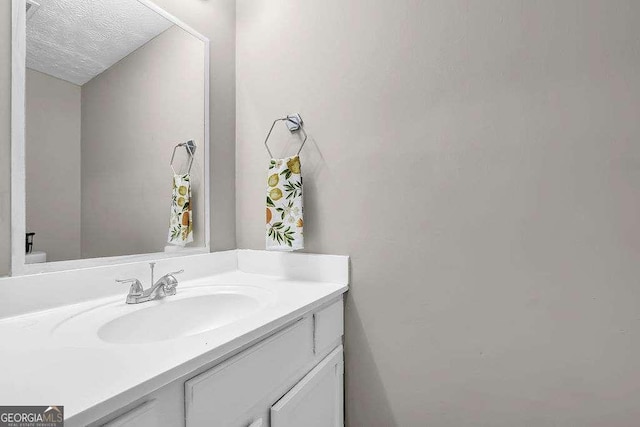 1066 Wedgewood Ln, Tucker, GA 30084 - bathroom with vanity and a textured ceiling