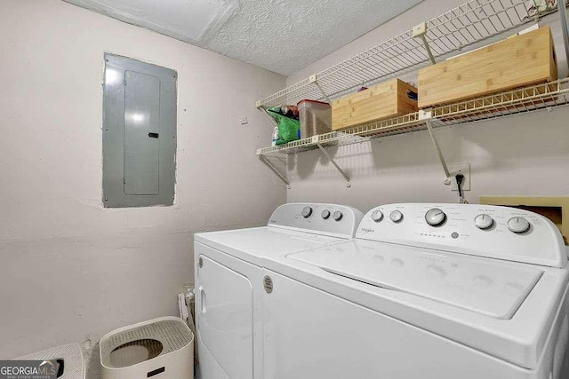 1066 Wedgewood Ln, Tucker, GA 30084 - washroom with electric panel and washer and dryer