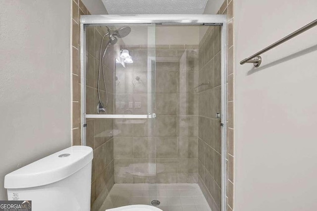 1066 Wedgewood Ln, Tucker, GA 30084 - bathroom with toilet and a stall shower