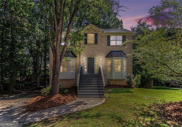 3440 Oaktree, Stonecrest, GA 30038 - view of front of house featuring a front yard and brick siding