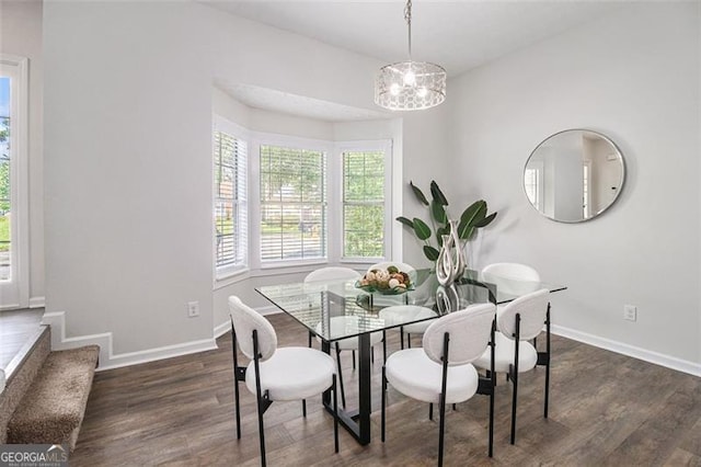3440 Oaktree, Stonecrest, GA 30038 - dining space featuring wood finished floors and a chandelier