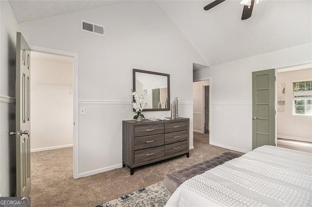 3440 Oaktree, Stonecrest, GA 30038 - carpeted bedroom featuring a walk in closet, a ceiling fan, high vaulted ceiling, and a closet