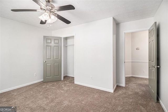 3440 Oaktree, Stonecrest, GA 30038 - unfurnished bedroom featuring carpet, a closet, a ceiling fan, and a textured ceiling
