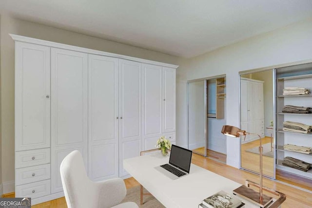 2575 Peachtree Rd NE Unit 15G, Atlanta, GA 30305 - office area featuring light wood-style flooring