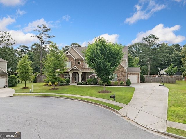 2767 NW Magnolia Creek Dr, Kennesaw, GA 30152 - view of front of property featuring driveway, a garage, and stone siding
