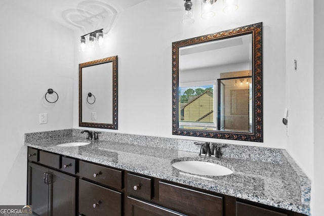 2767 NW Magnolia Creek Dr, Kennesaw, GA 30152 - bathroom featuring double vanity and a shower with door