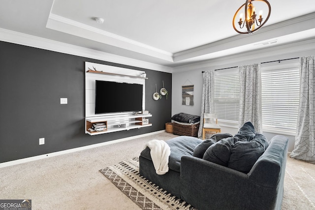 2767 NW Magnolia Creek Dr, Kennesaw, GA 30152 - carpeted living area with a raised ceiling, a chandelier, and crown molding