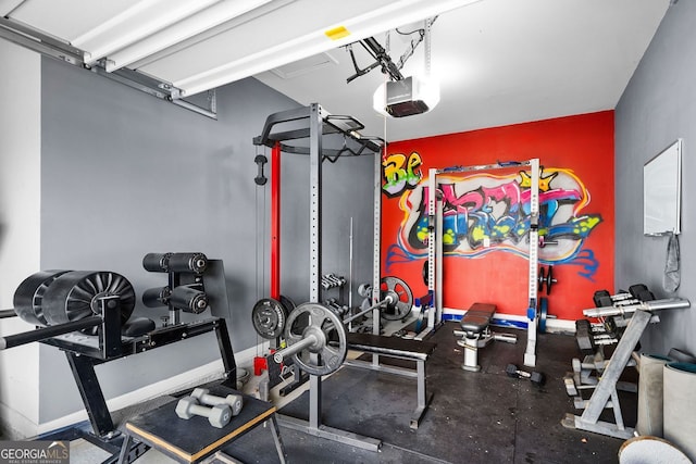 2767 NW Magnolia Creek Dr, Kennesaw, GA 30152 - exercise room with a garage and baseboards