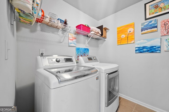 2767 NW Magnolia Creek Dr, Kennesaw, GA 30152 - washroom featuring independent washer and dryer and light tile patterned floors