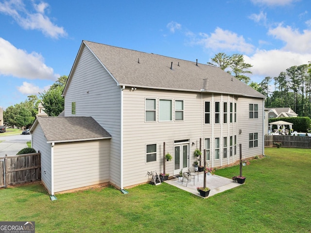 2767 NW Magnolia Creek Dr, Kennesaw, GA 30152 - rear view of property featuring a patio area and roof with shingles