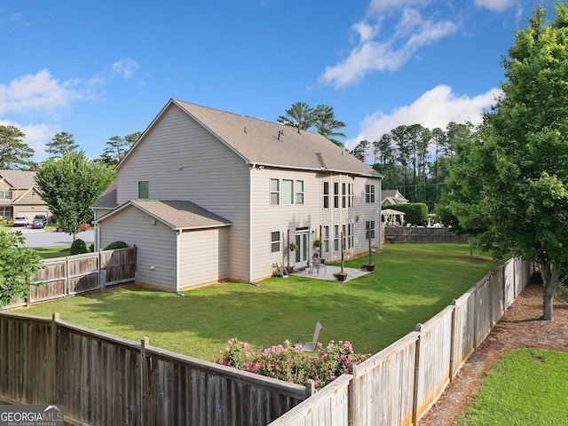 2767 NW Magnolia Creek Dr, Kennesaw, GA 30152 - rear view of house with a patio and a fenced backyard