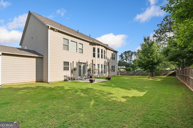 2767 NW Magnolia Creek Dr, Kennesaw, GA 30152 - back of property with a patio and a fenced backyard