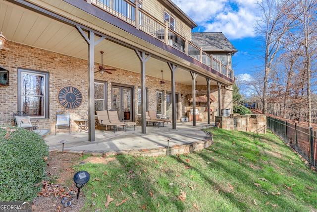6226 Random Winds Blf, Gainesville, GA 30506 - back of property with ceiling fan, a patio, a balcony, brick siding, and roof with shingles