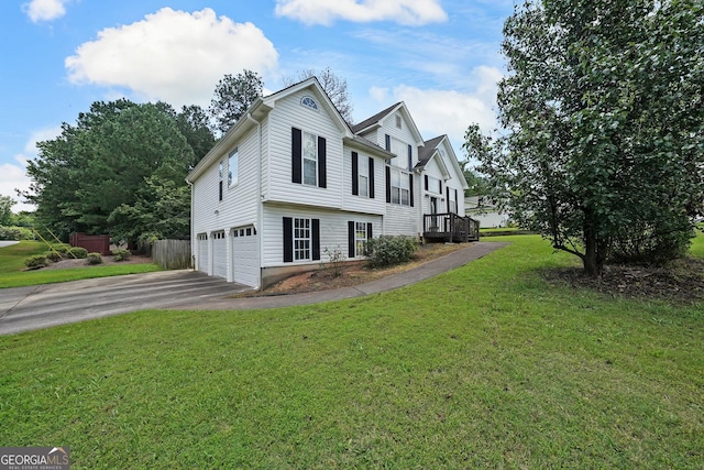 443 Brooks Rd, Dallas, GA 30132 - view of home's exterior with asphalt driveway, a garage, and a yard