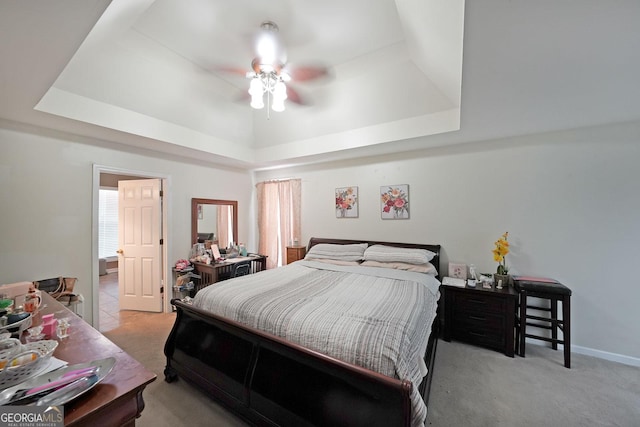 443 Brooks Rd, Dallas, GA 30132 - bedroom with a raised ceiling, light carpet, and a ceiling fan