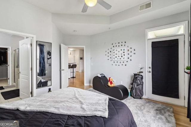 390 17th St NW Unit 6055, Atlanta, GA 30363 - bedroom with wood finished floors and ceiling fan