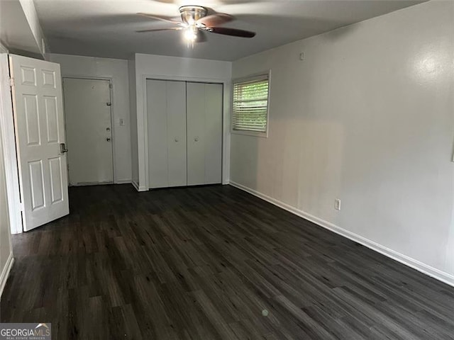2436 Glenrock Dr, Decatur, GA 30032 - unfurnished bedroom featuring dark wood-type flooring, a closet, and ceiling fan