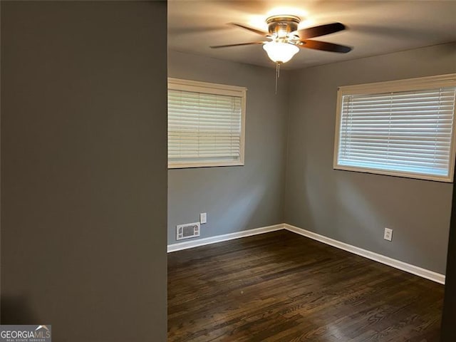 2436 Glenrock Dr, Decatur, GA 30032 - spare room featuring a ceiling fan and dark wood-type flooring