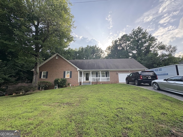 2119 Amherst Trl SE, Conyers, GA 30094 - single story home with covered porch, an attached garage, brick siding, and a front lawn