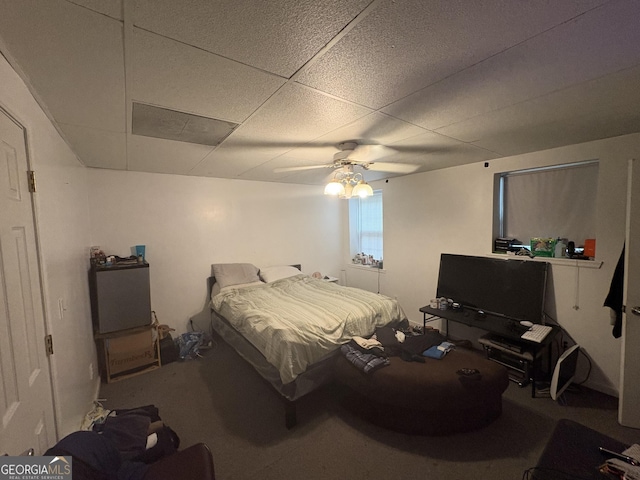 2119 Amherst Trl SE, Conyers, GA 30094 - bedroom with a drop ceiling and a ceiling fan